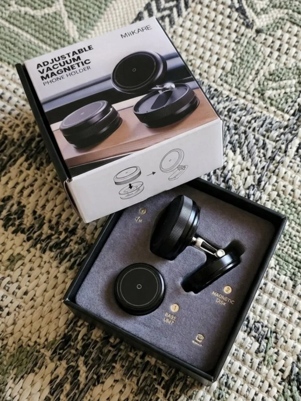 Adjustable Vacuum Magnetic Phone Holder by the brand MiiKARE.